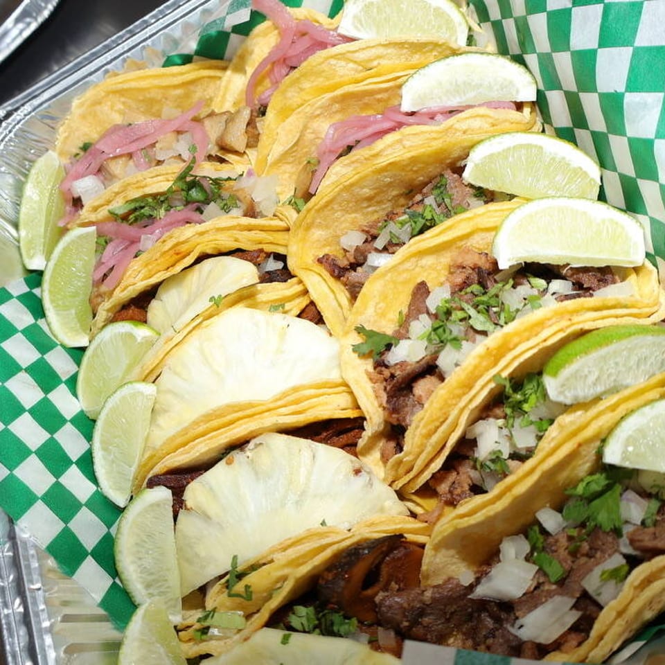 Catering tacos with pineapple and lime